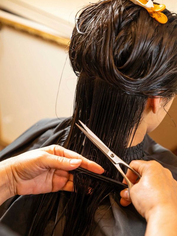 A woman getting a haircut